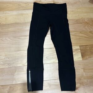 Lululemon running tights with leg reflectors size 4.